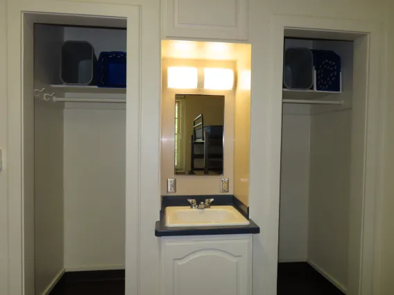 Sink and closets in double dorm room in Maricopa