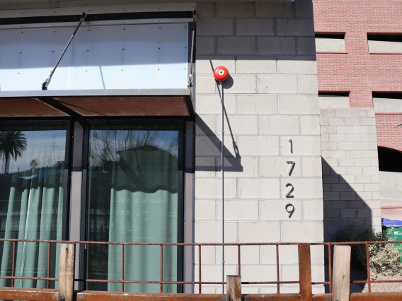 University Rowhouse exterior with sliding glass doors