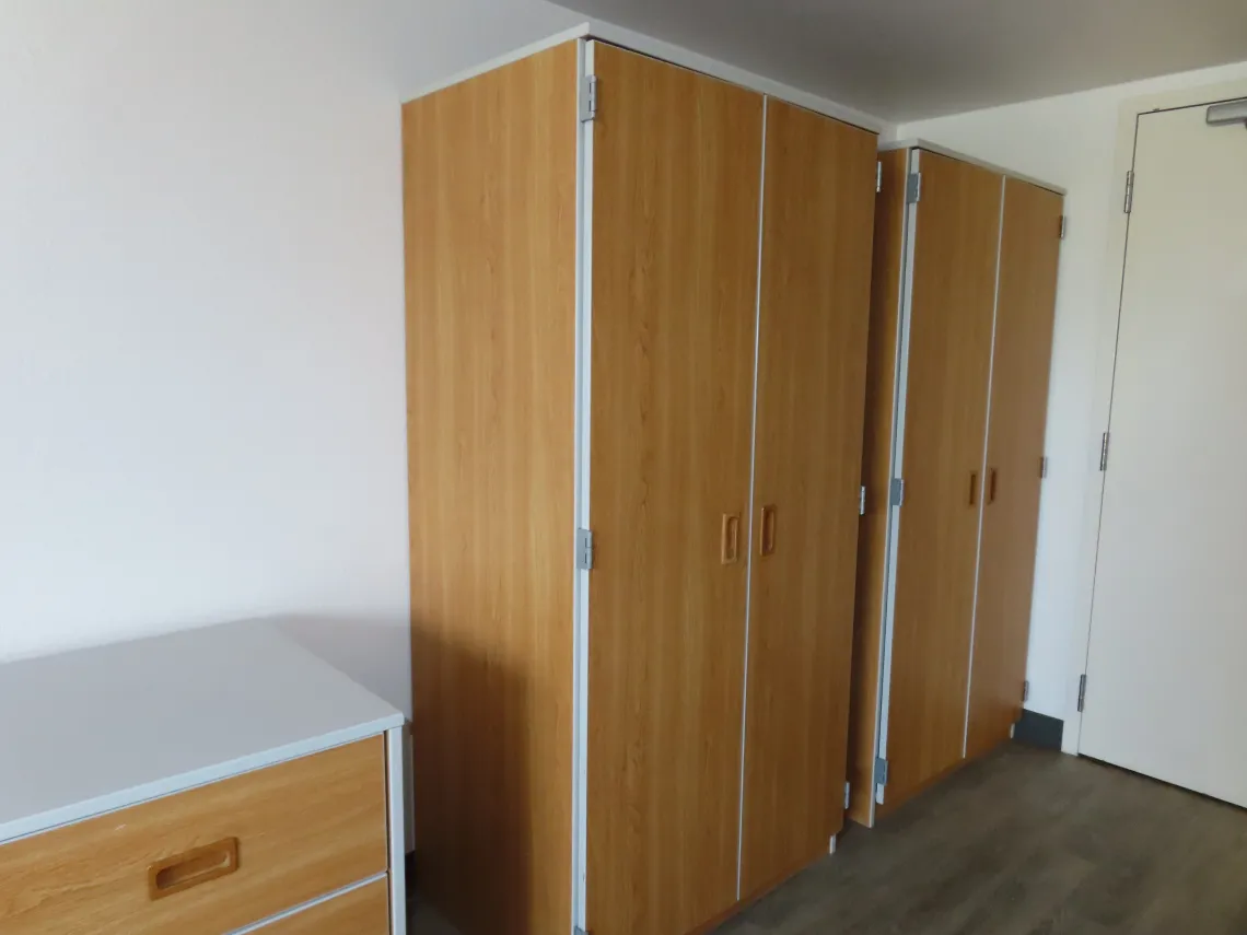 Closets in double dorm room in Pima